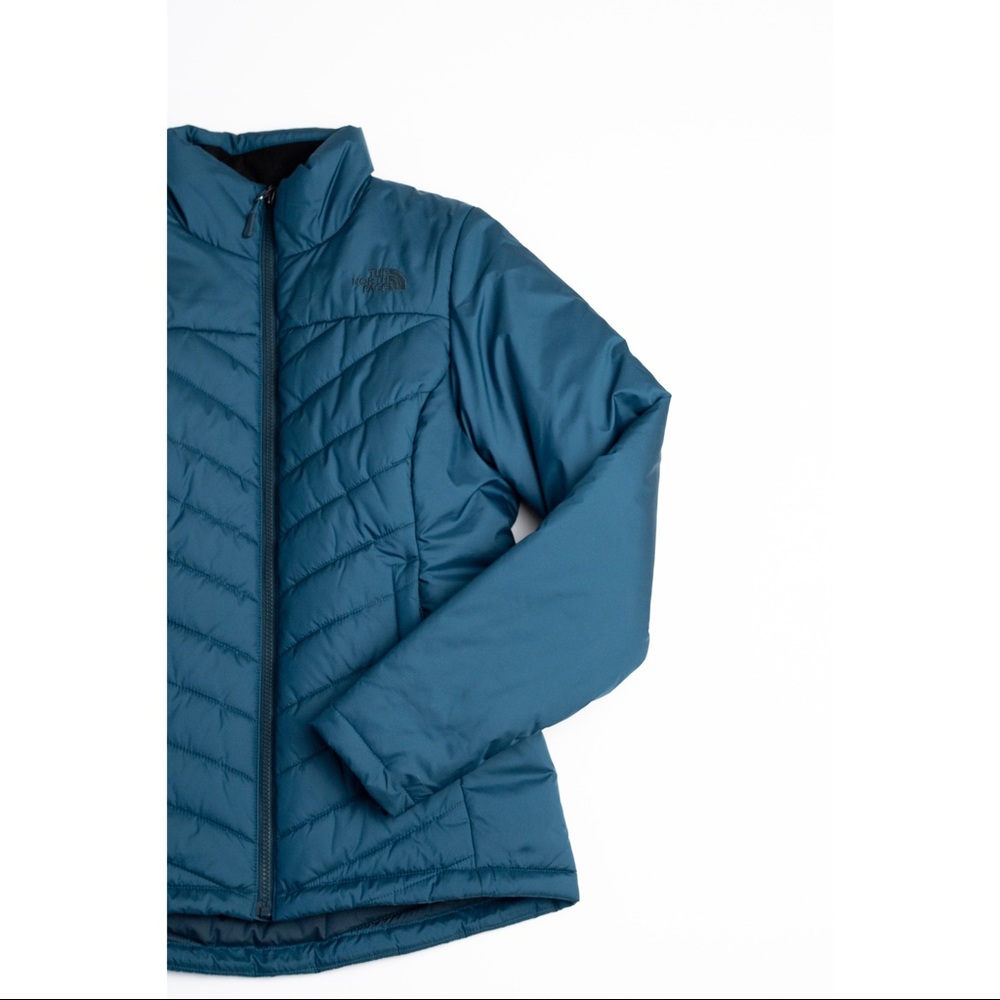 The North Face teal puffer jacket